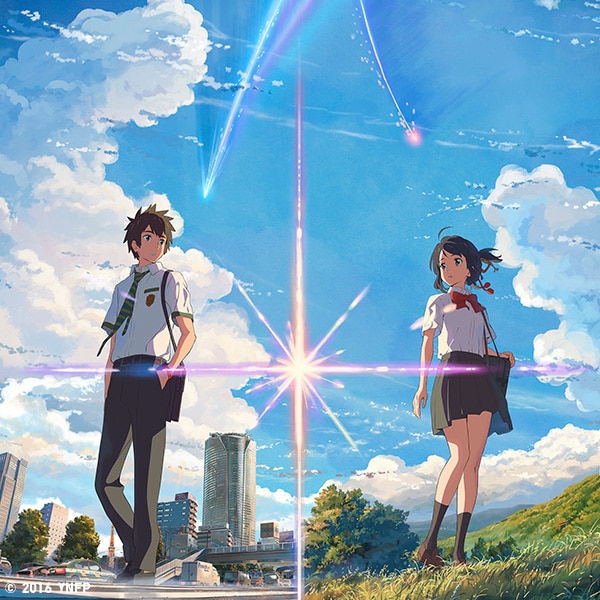 The theatrical release art for 'your name'; a young man and woman stand in opposite world connected by a glowing light.