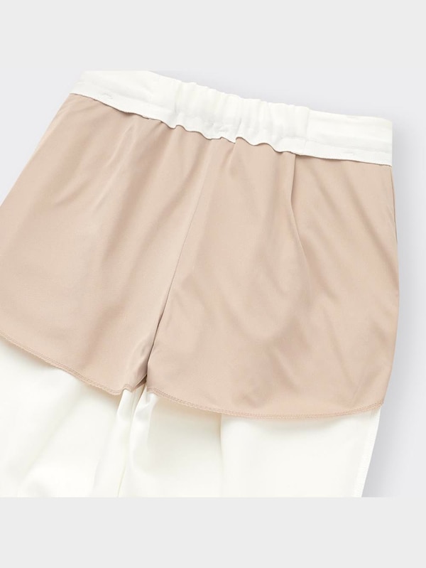 タックテーパードパンツ(丈標準65.0～69.0cm)