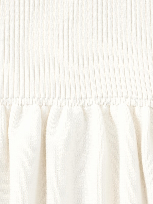 ペプラムニットプルオーバー(半袖)