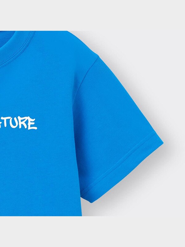 KIDS(男女兼用)グラフィックT(半袖)バックプリントフラワー