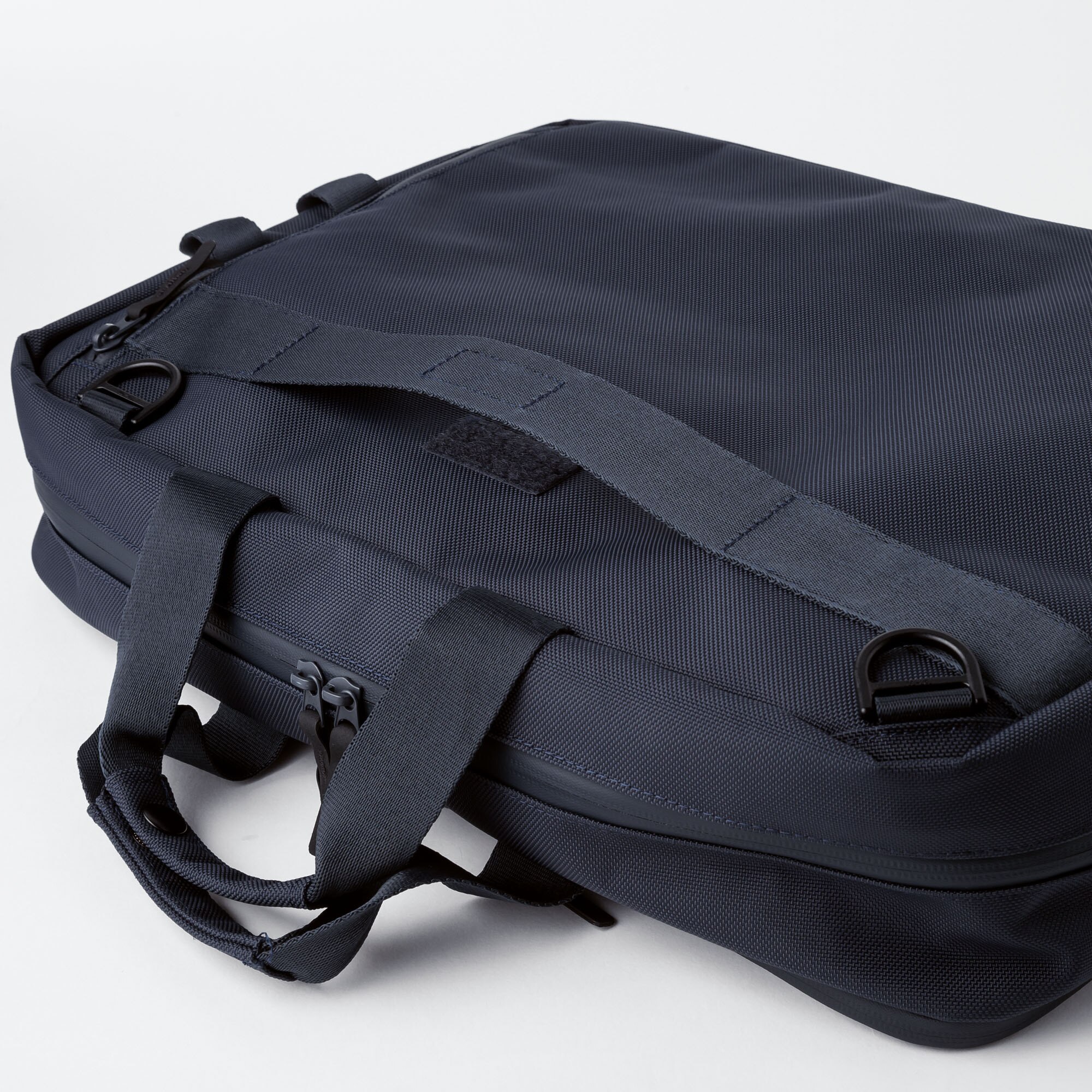 uniqlo three way bolsa