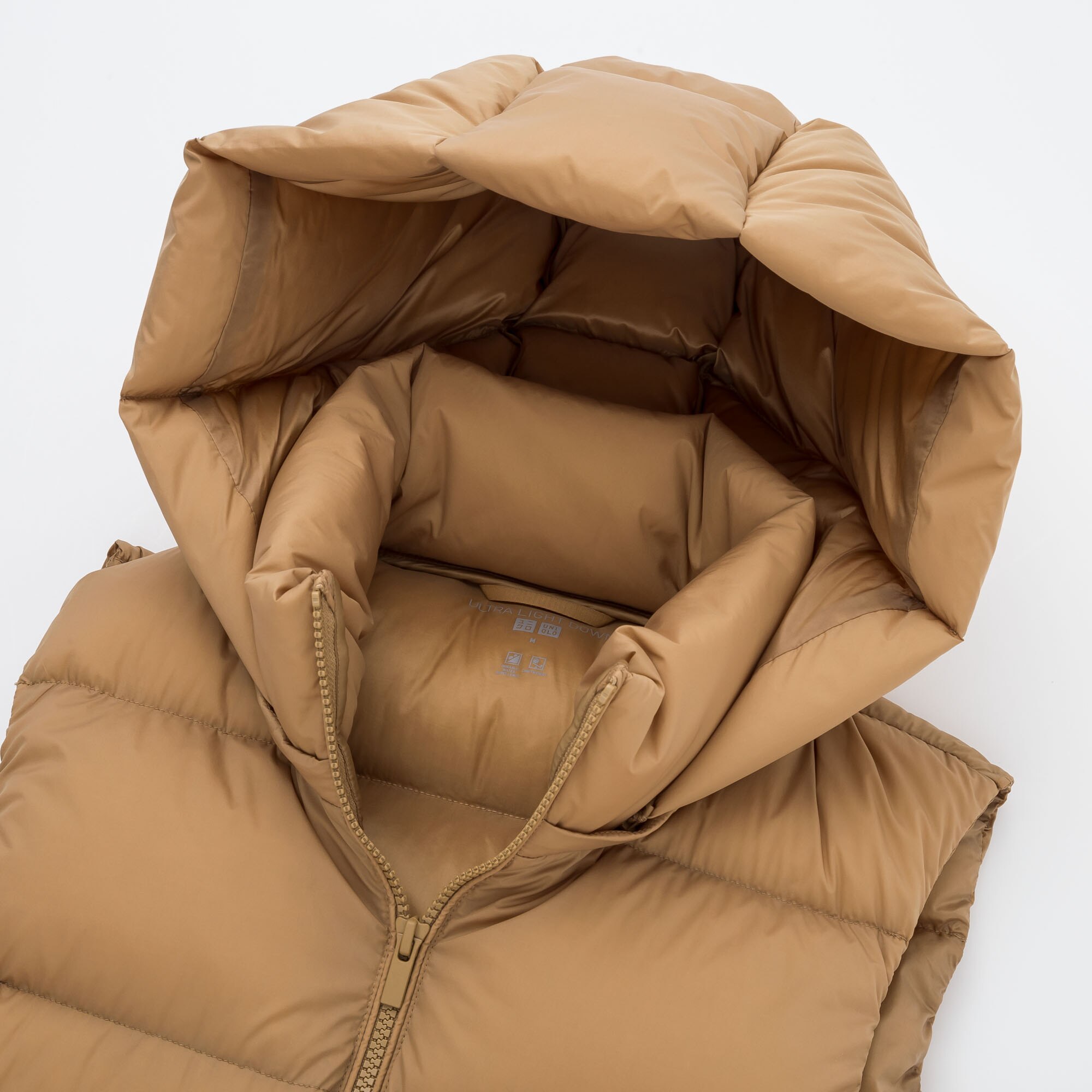 beige down vest