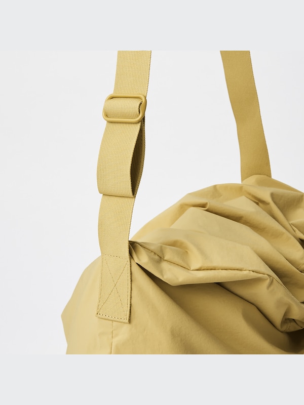 U Drawstring Shoulder Bag