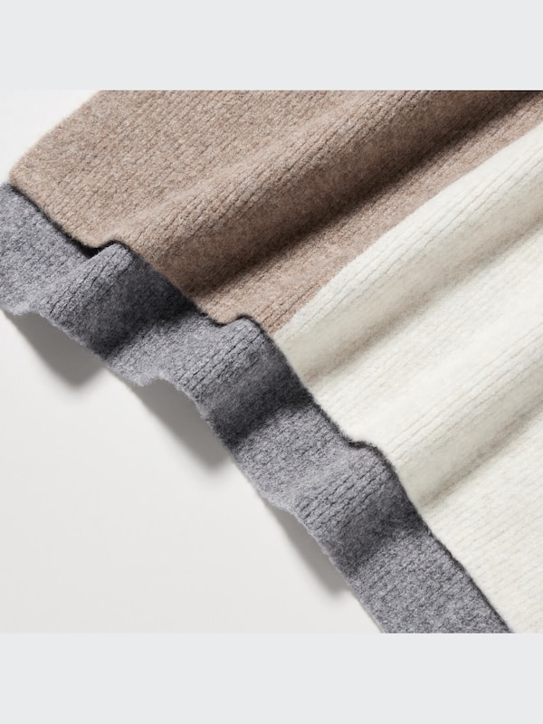 PONCHO EN FIL SOUFFLÉ DOUBLE EXTENSION