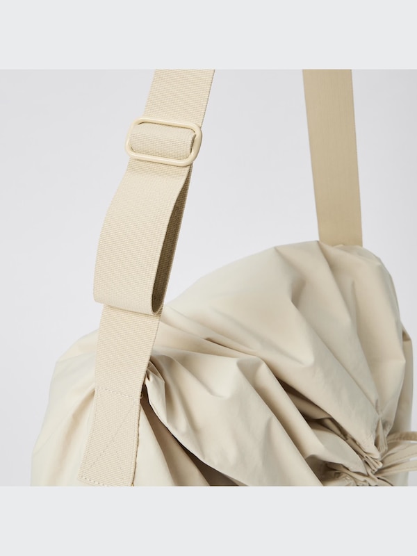 U Drawstring Shoulder Bag