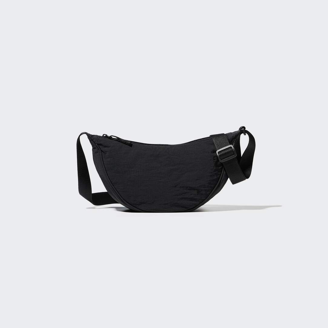Uniqlo viral nylon cross body round bag with zip fastening and adjustable strap. 
