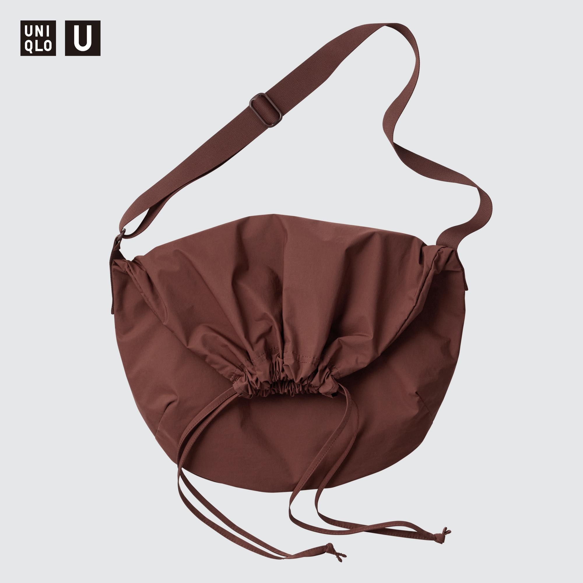 LEATHER SMALL ROUND STRING POUCH - AURALEE Official Website