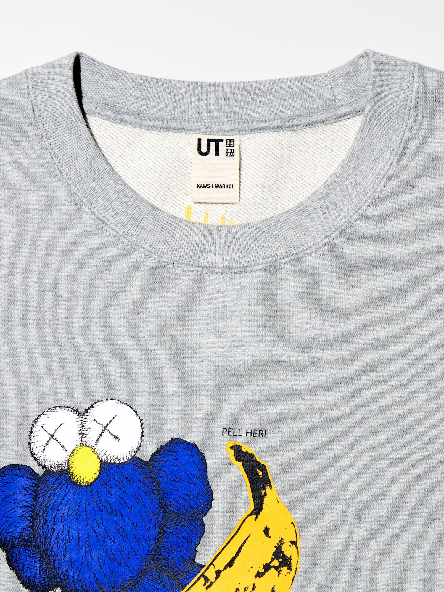 Kaws uniqlo crewneck online