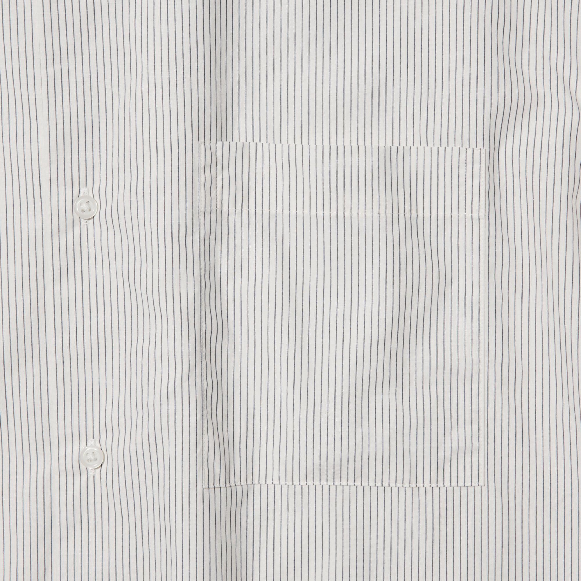 The left chest pocket adds style and convenience.