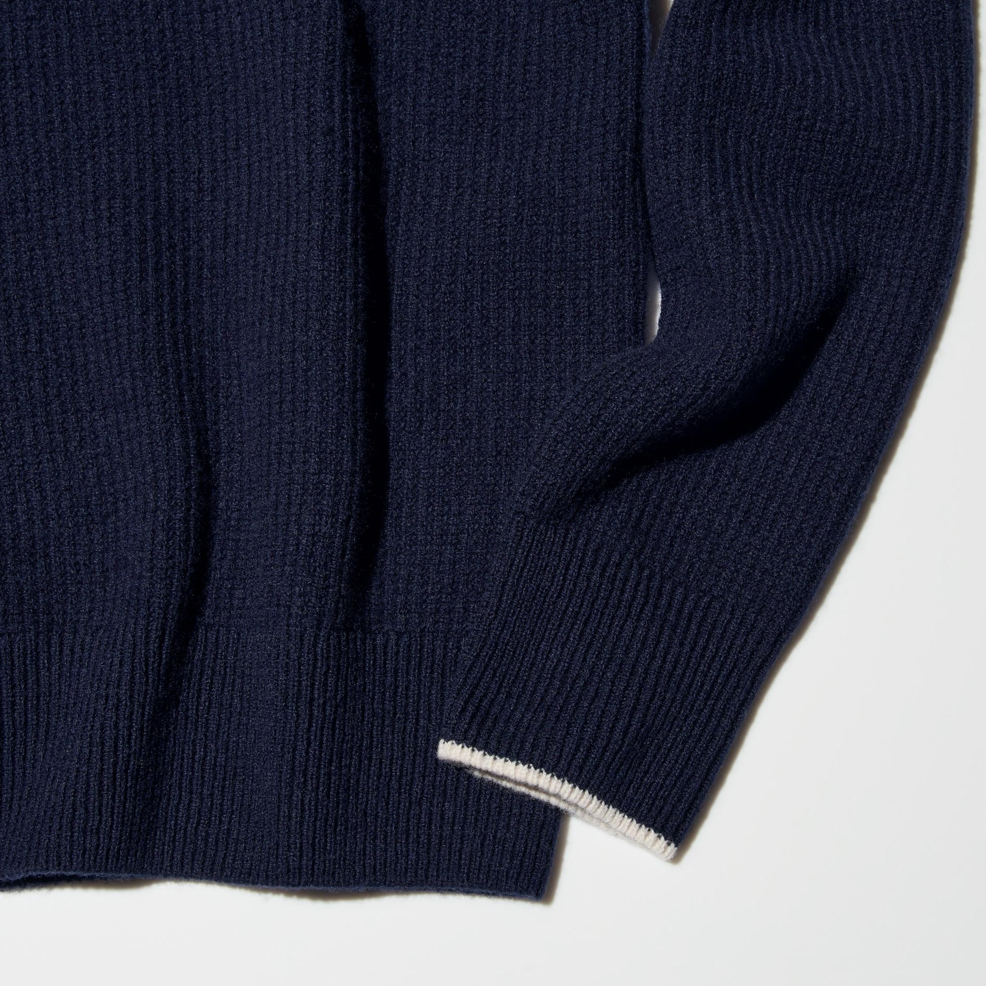 Accented by fine tipping at the cuffs.