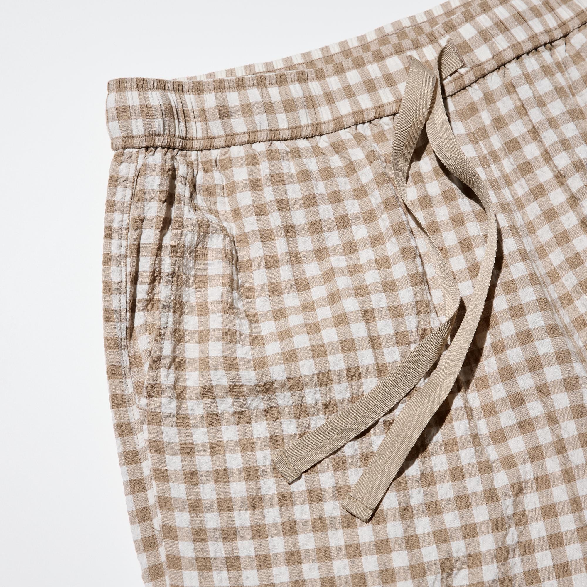 Comfortable elastic waist with an outer drawstring for adjustment.