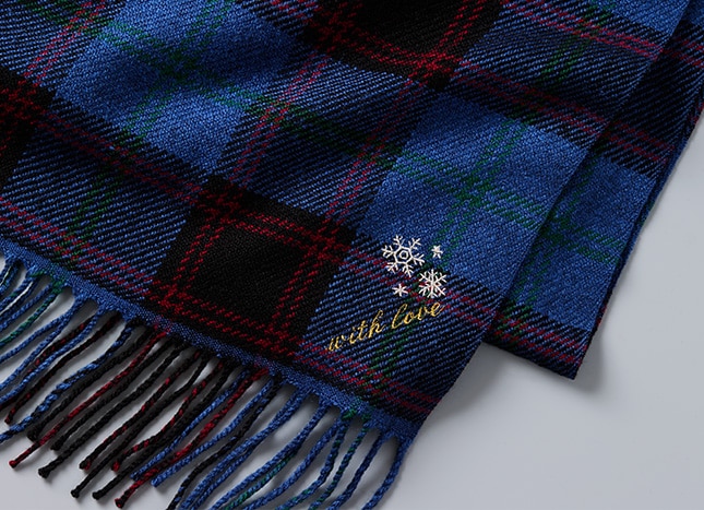 blue checked scarf embroidered with snow flakes and the words 'with love'