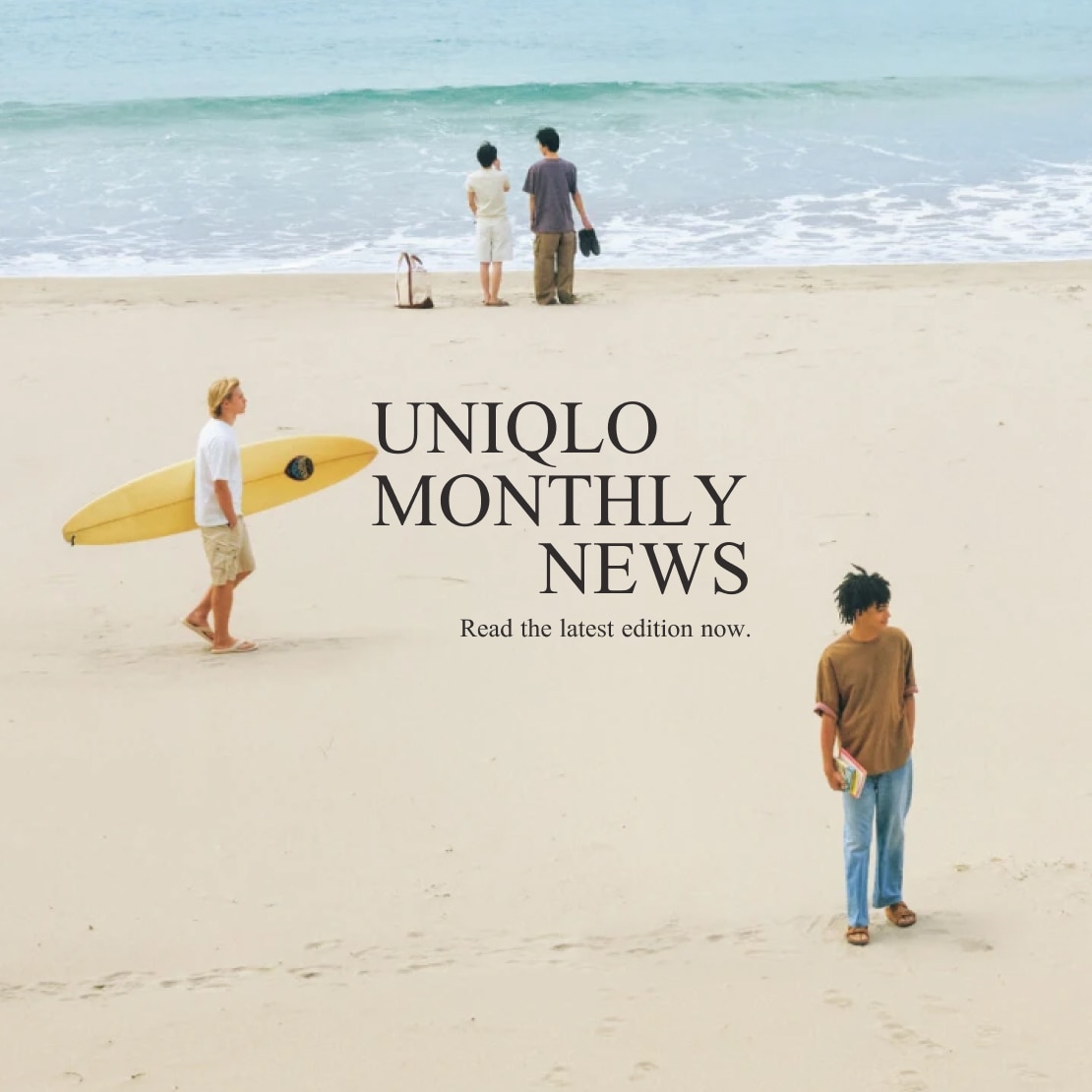 models standing on the beach looking out to see above the words uniqlo monthly news