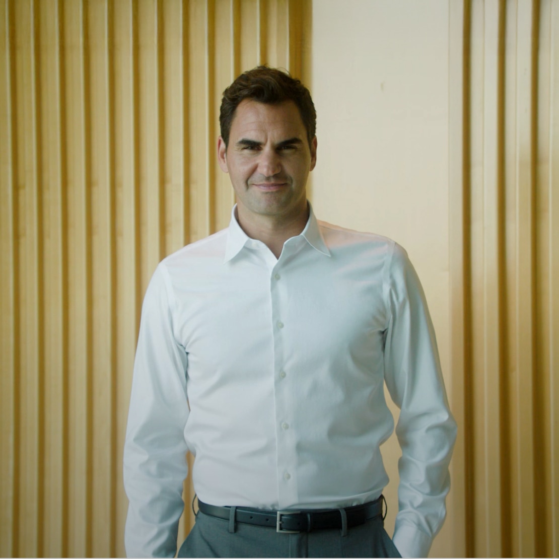 brand ambassador Roger Federer wearing a white shirt