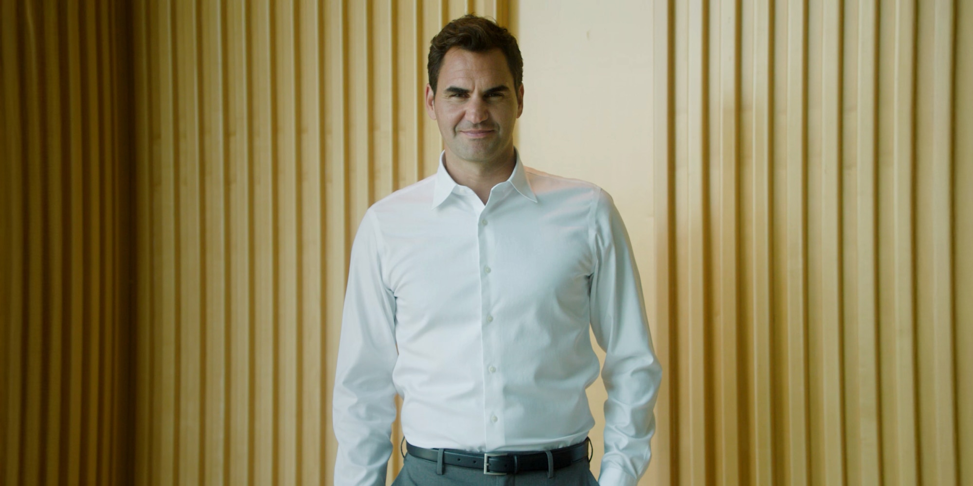 brand ambassador Roger Federer wearing a white shirt