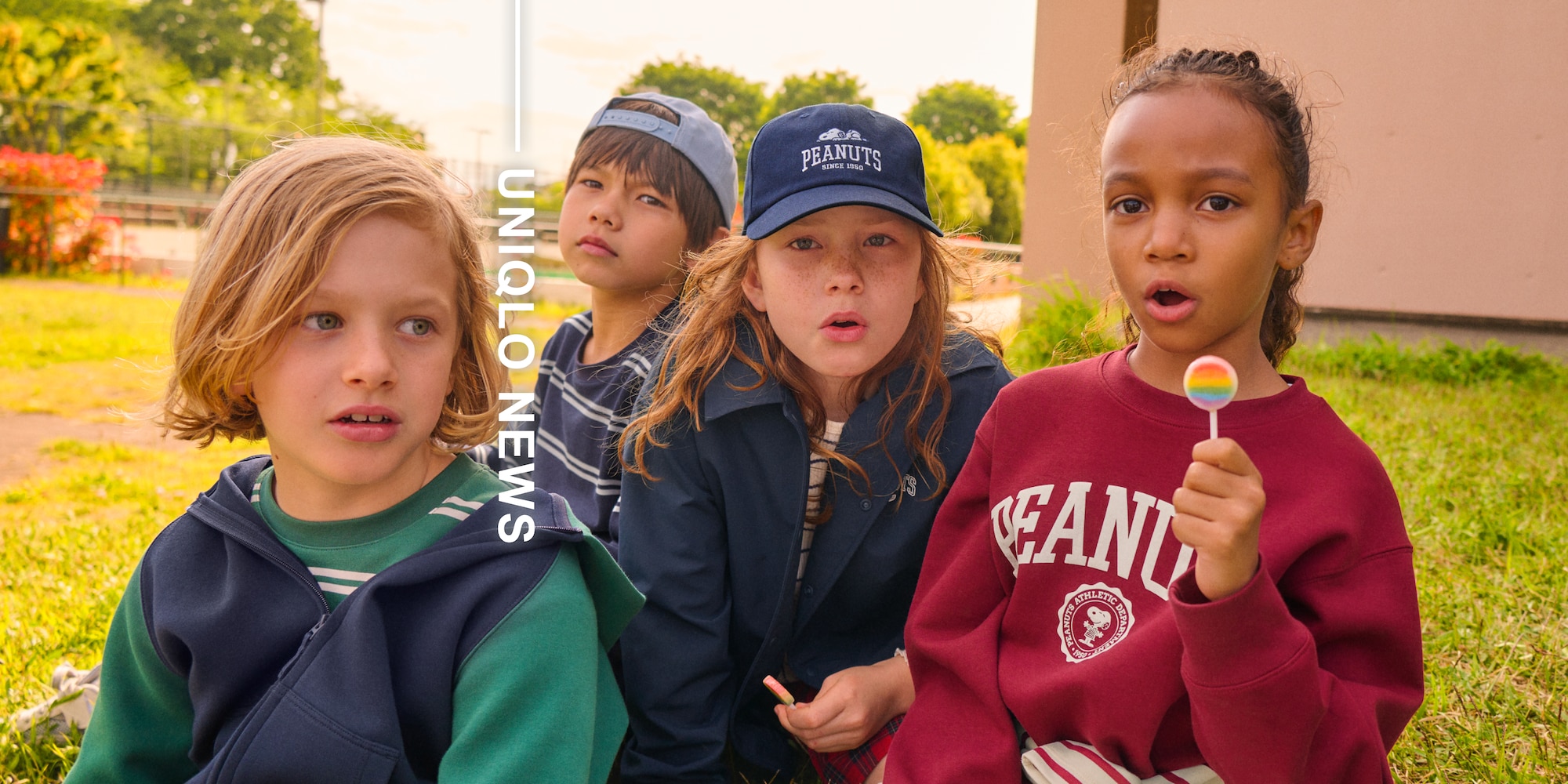 four models wearing uniqlo sweats, jackets and caps while looking directly at the camera