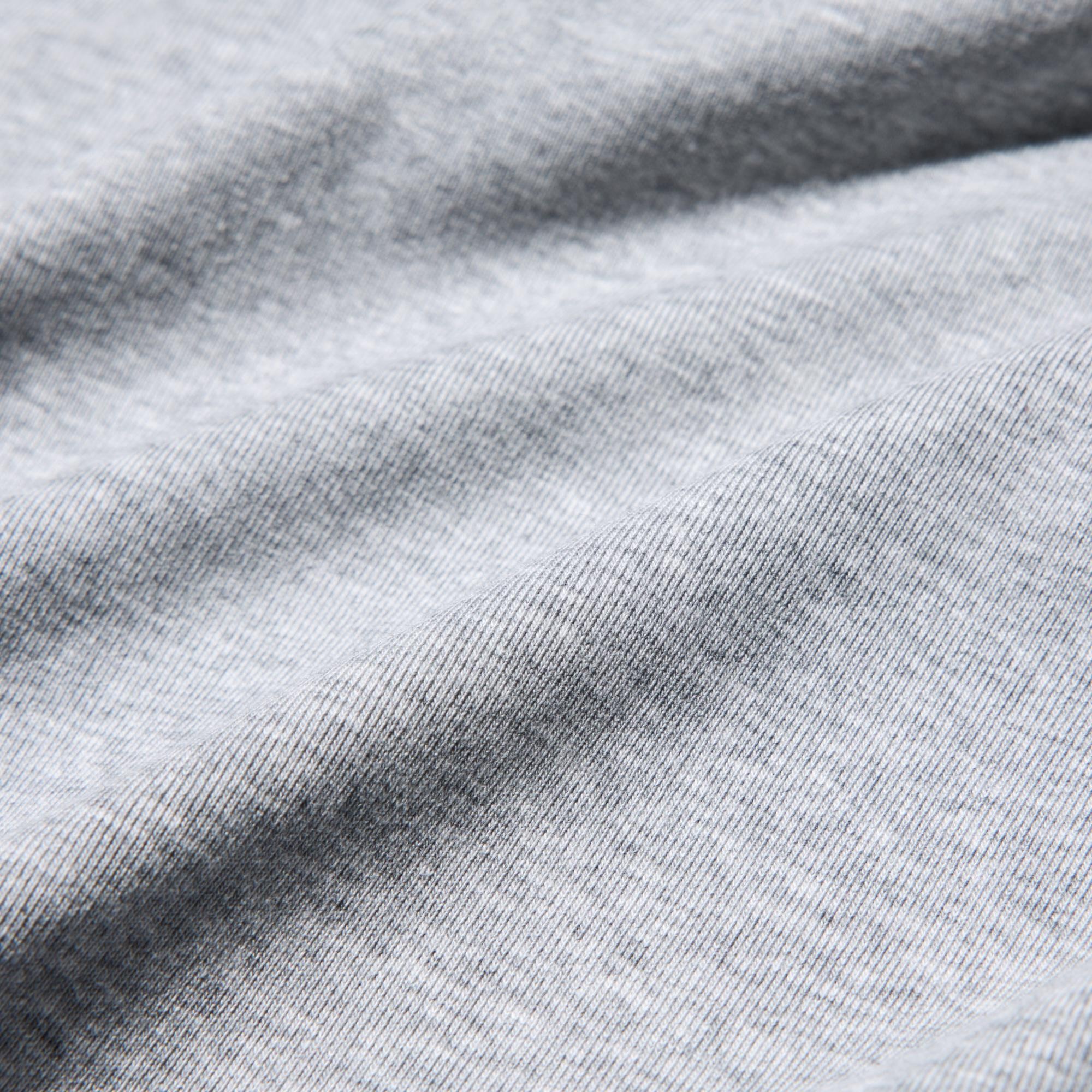 Natural cotton-blend fabric with a smooth surface and soft texture.