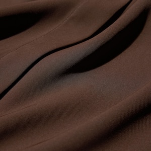 Smooth, comfortable fabric with a flowing drape.