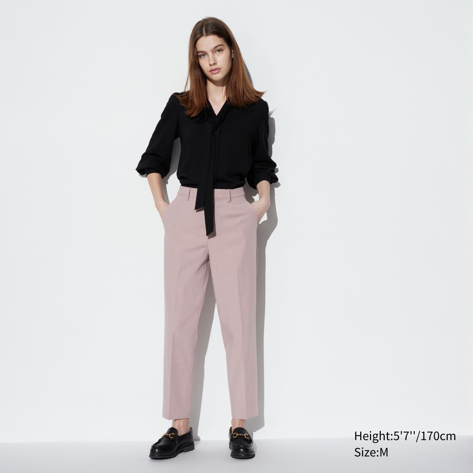 New with tag. Uniqlo black trousers ankle length elasticated waistband.  Size S. Polyester Viscose Elastane ref.215454 - Joli Closet