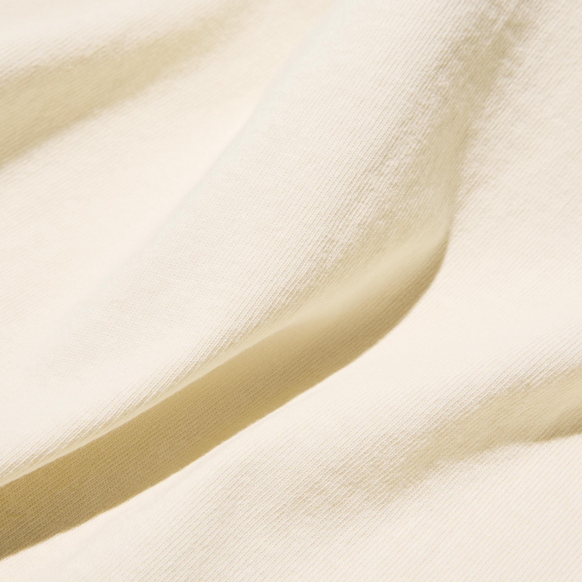 Heavyweight 100% cotton jersey fabric combines  a rugged look. Pre-washed to create casual colors. 3/4-length sleeves.
