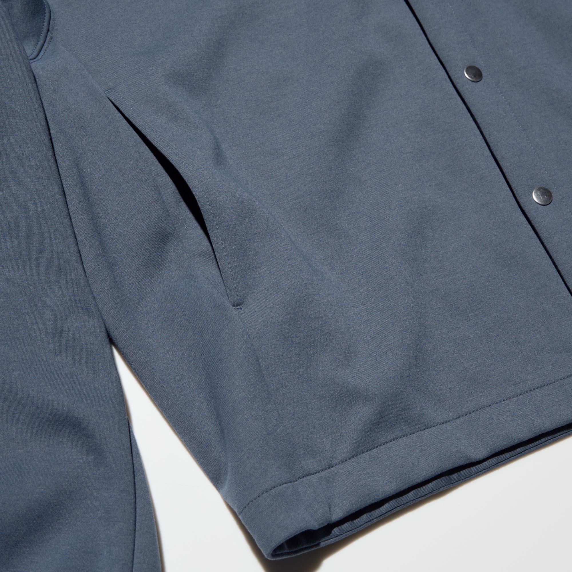 Fastens with metal snaps at the front.