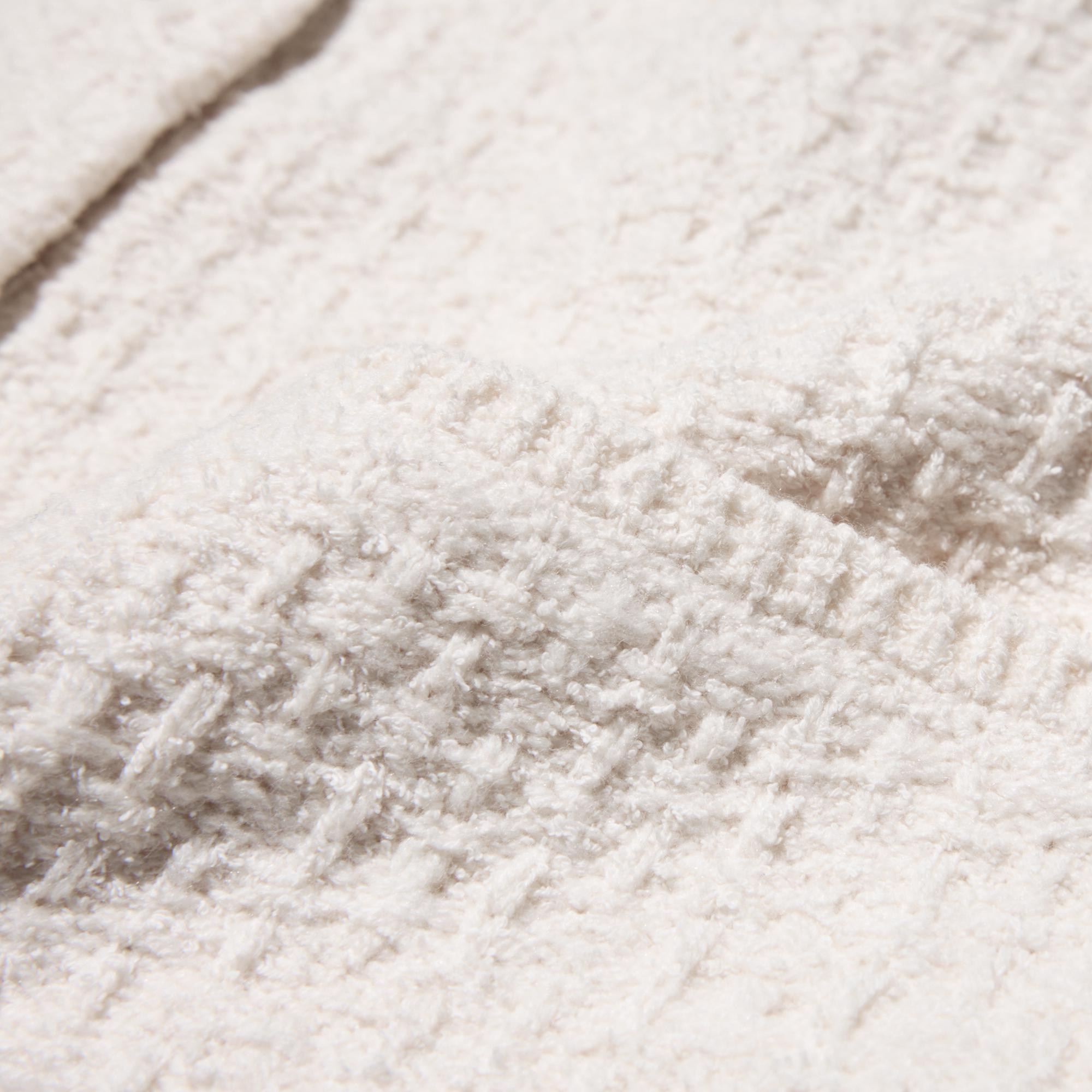 Textured knit adds a distinctive style to any outfit.