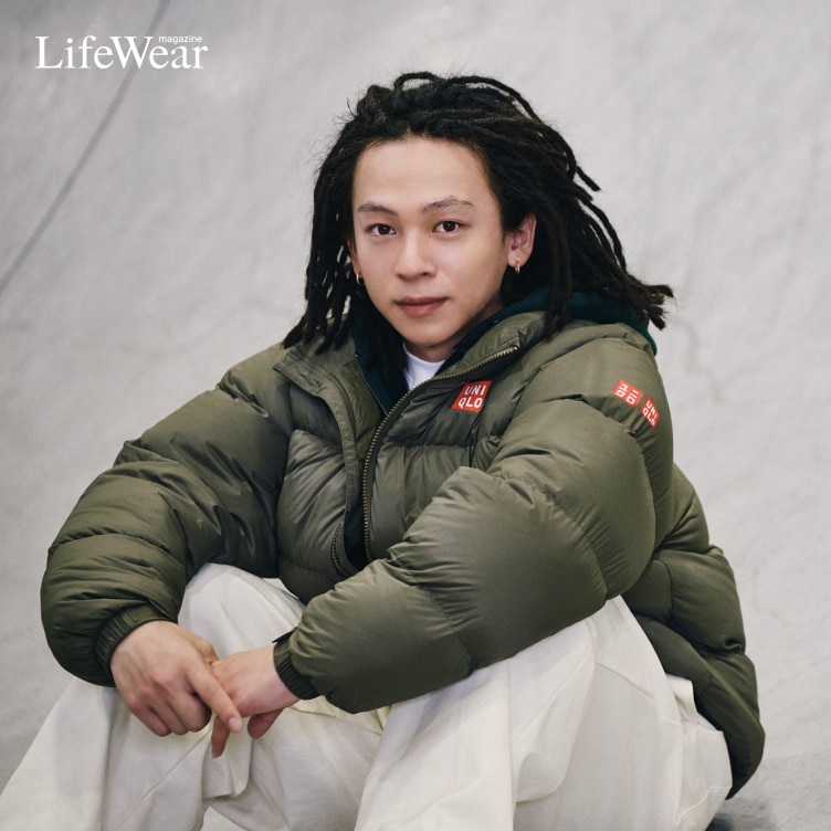 Pro snowboarder Ayumu Hirano wearing competition spec Light Down Volume Jacket in olive green with uniqlo logos