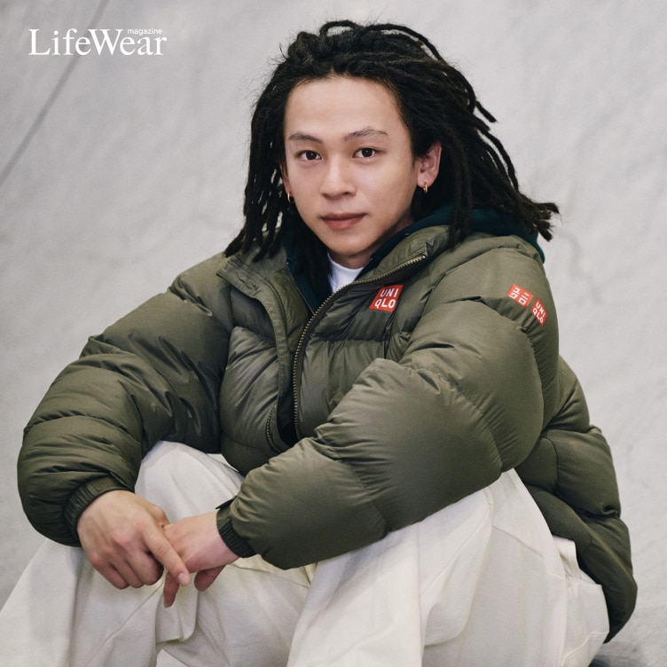 Pro snowboarder Ayumu Hirano wearing competition spec Light Down Volume Jacket in olive green with uniqlo logos