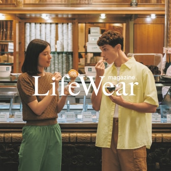 models wearing Pointelle Crew Neck Jumper, Cotton Relaxed Ankle Trousers, Cotton Linen Shirt, Crew Neck T-Shirt and Cargo Shorts