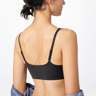 model wearing relax wireless bra in black, shown from the back