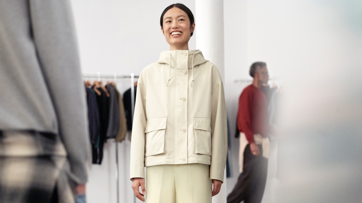 model wearing off white parka with off white trousers