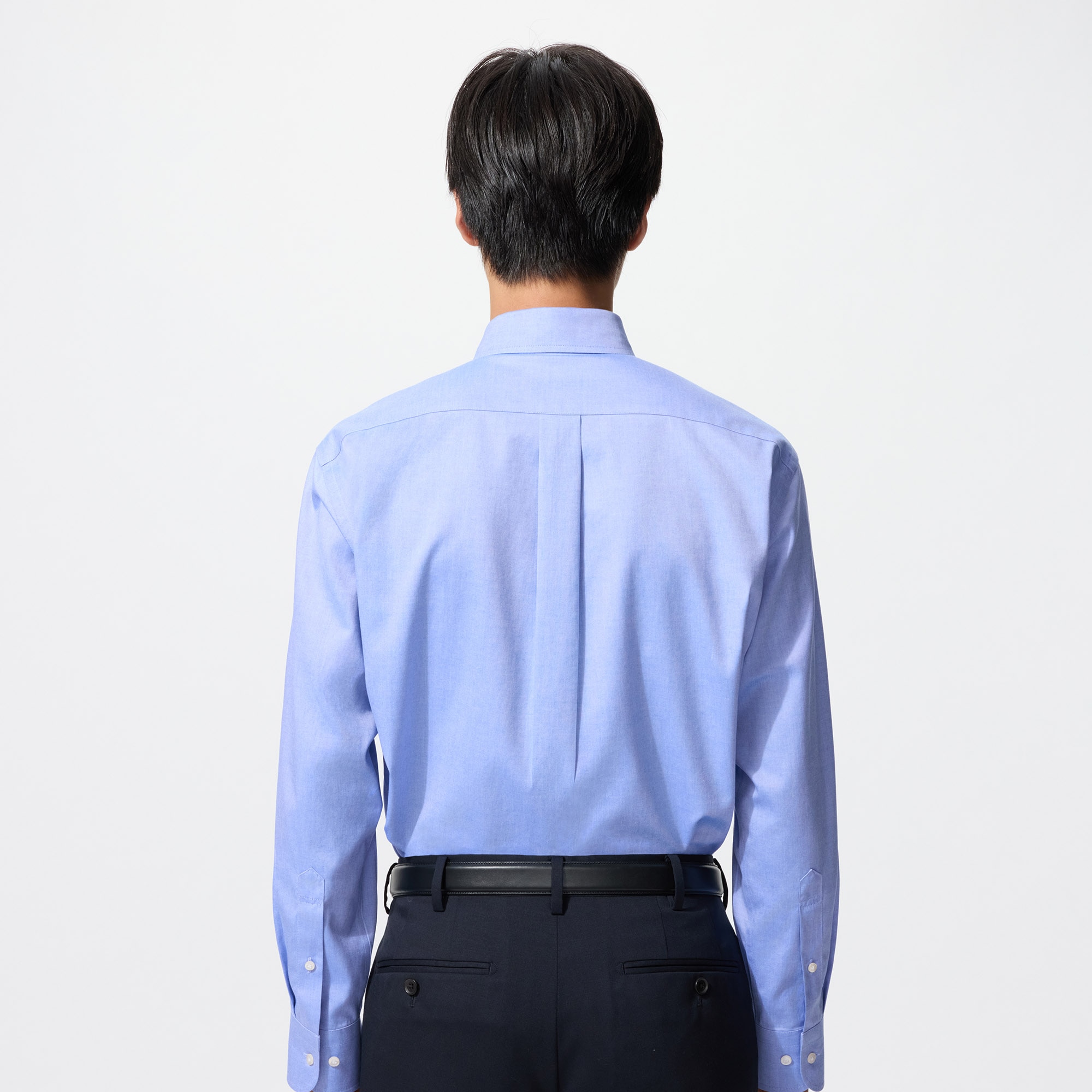 model wearing a Regular Fit shirt in light blue, shown from the back