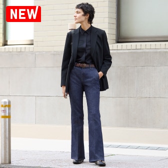 model wearing UNIQLO Slim Flare Jeans in navy