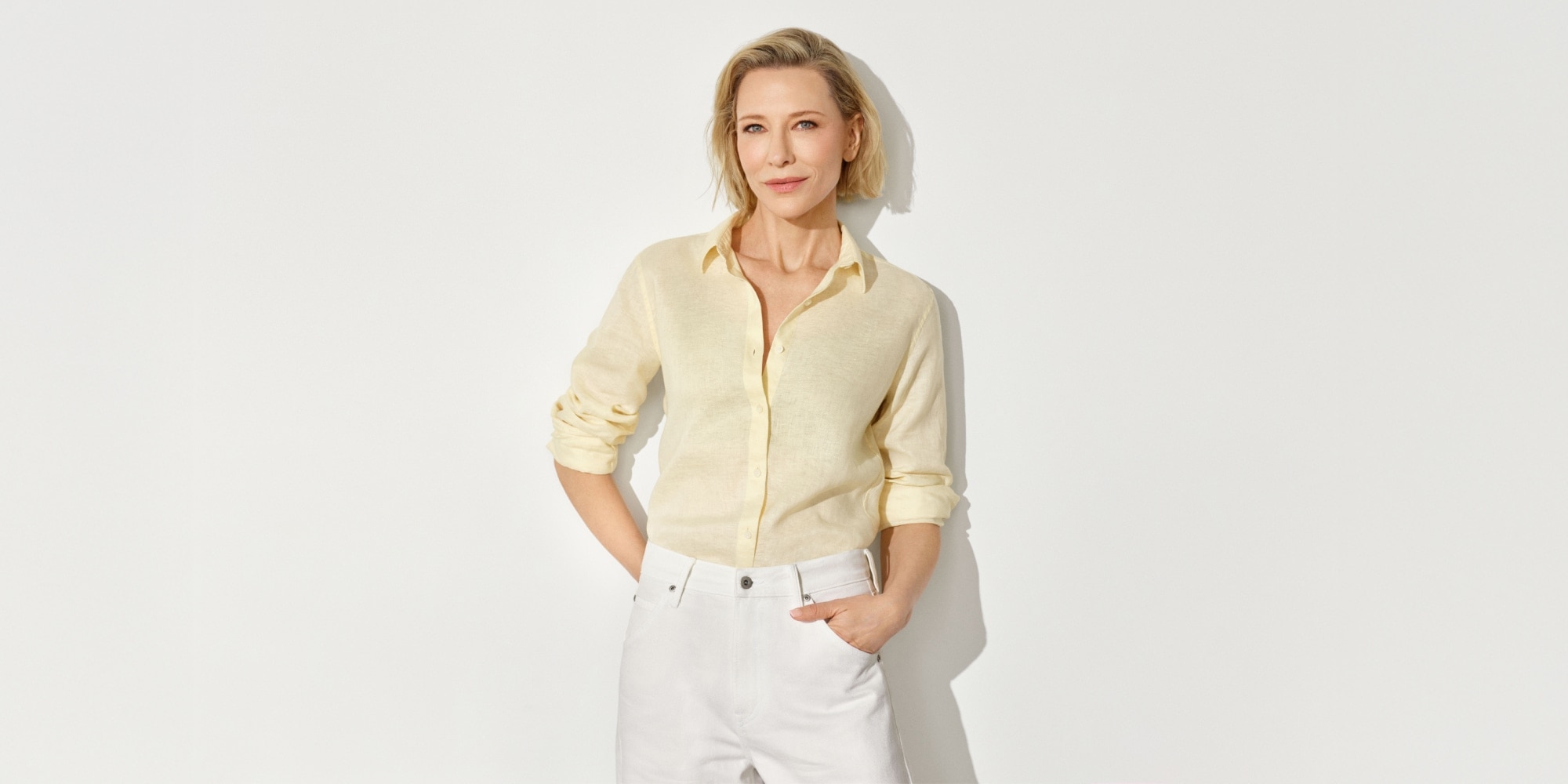 Cate Blanchett wearing 100% Premium Linen Shirt in pale yellow with white jeans
