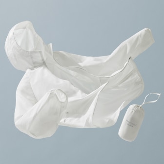 Pocketable UV Protection Parka in off white suspended in mid-air