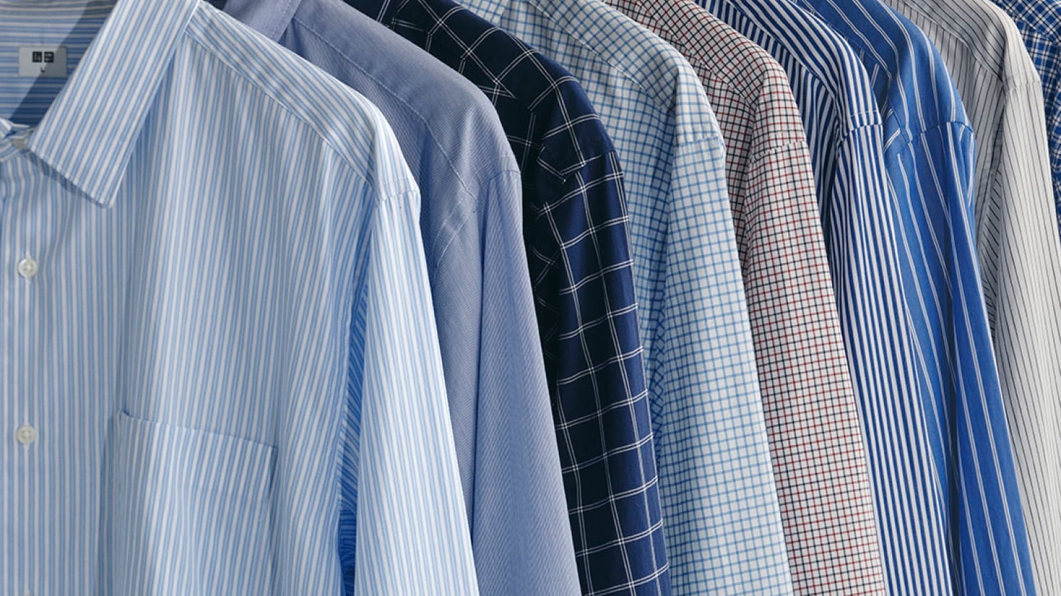 a rail of broadcloth shirts in different patterns and colours