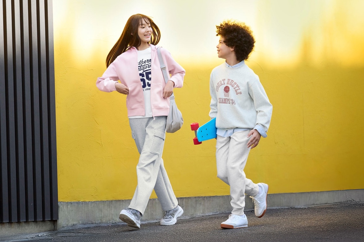 two models walking while wearing UNIQLO sweats
