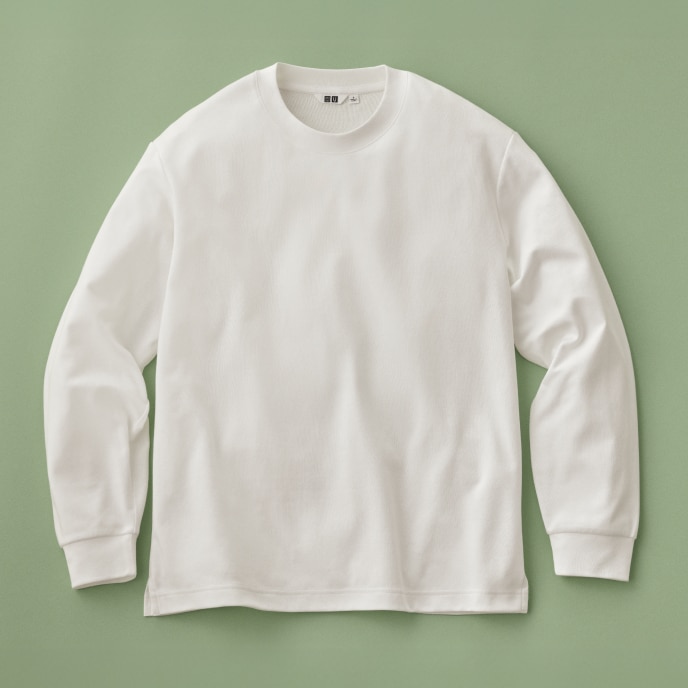 AIRism Cotton Crew Neck T-Shirt in white against a green background