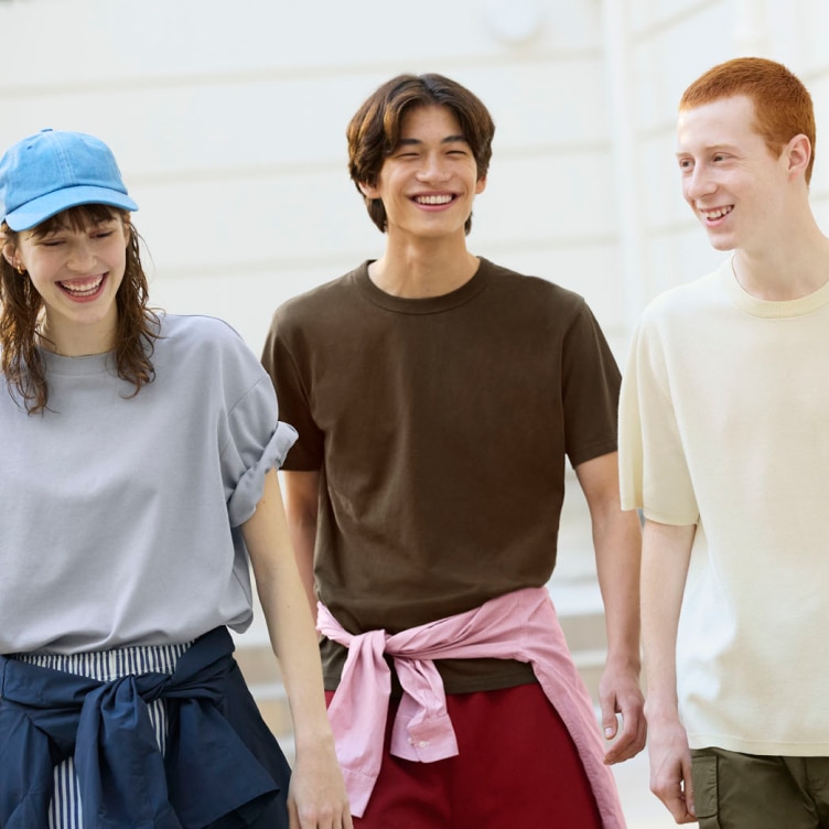 group of models wearing UNIQLO T-shirts outside in the sunshine