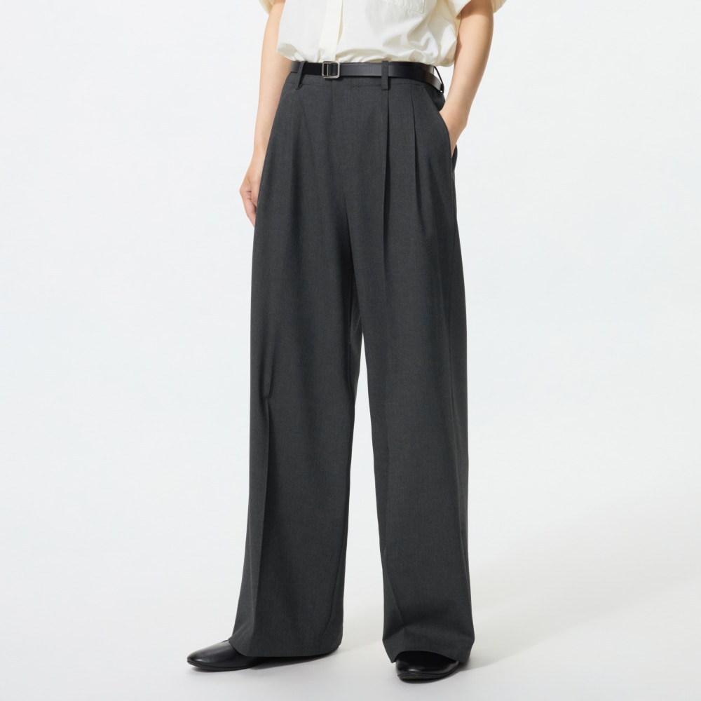 Mid-rise design with two front pleats, a clean waistline, and a wide straight silhouette.