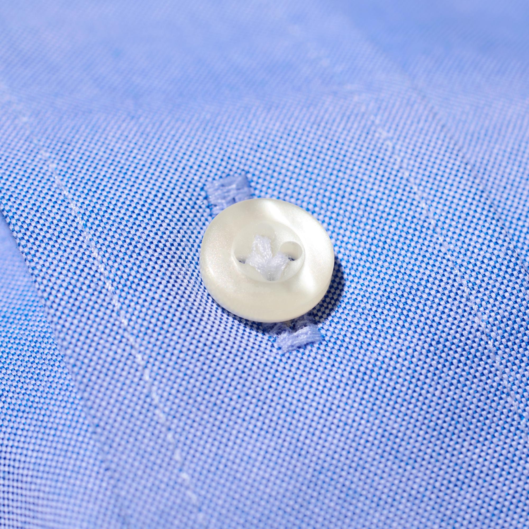Special button stitching allows buttons to be fastened with one hand.