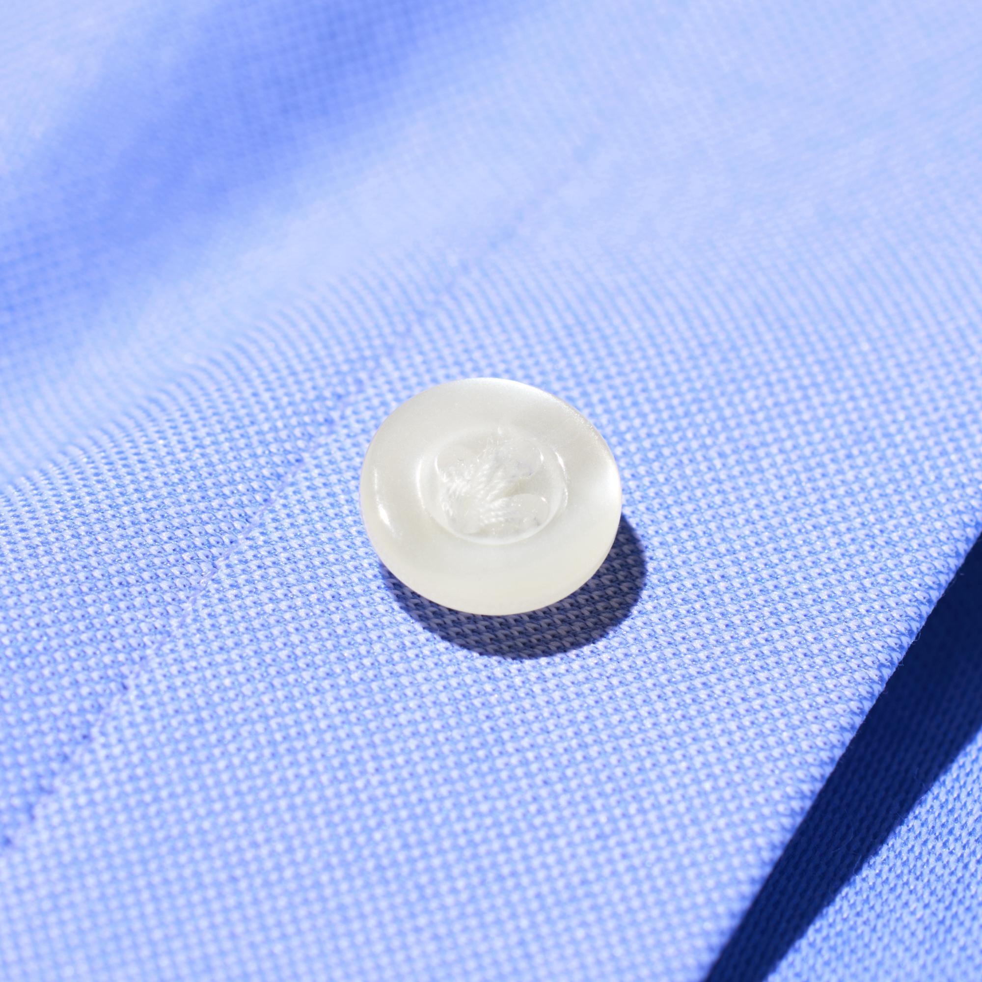 Special button stitching allows buttons to be fastened with one hand.