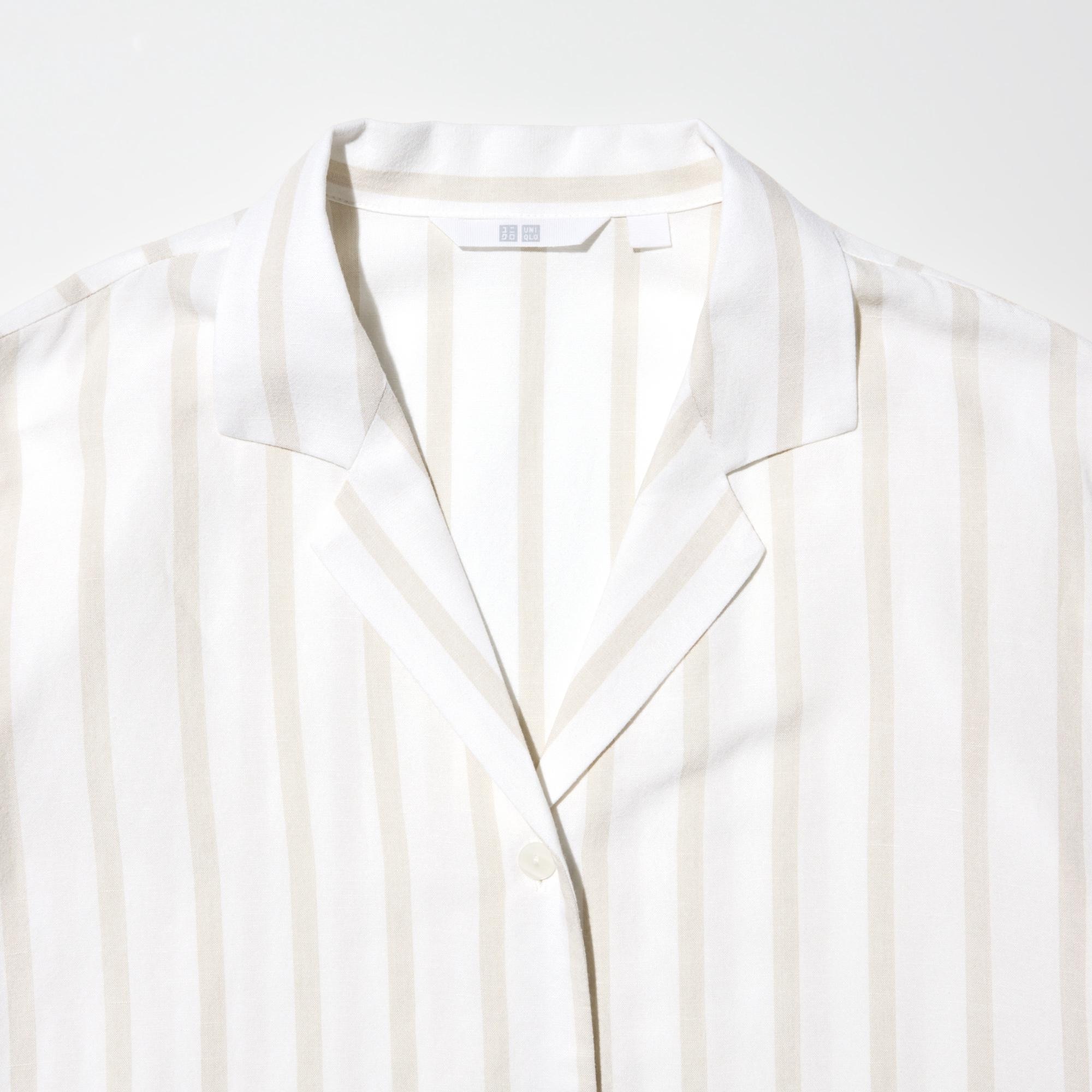 Sleek open collar design.