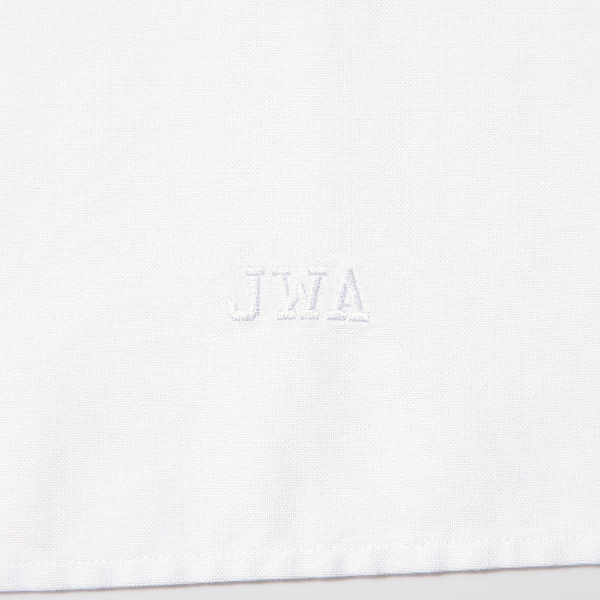 JW ANDERSON logo embroidery on the front hem.