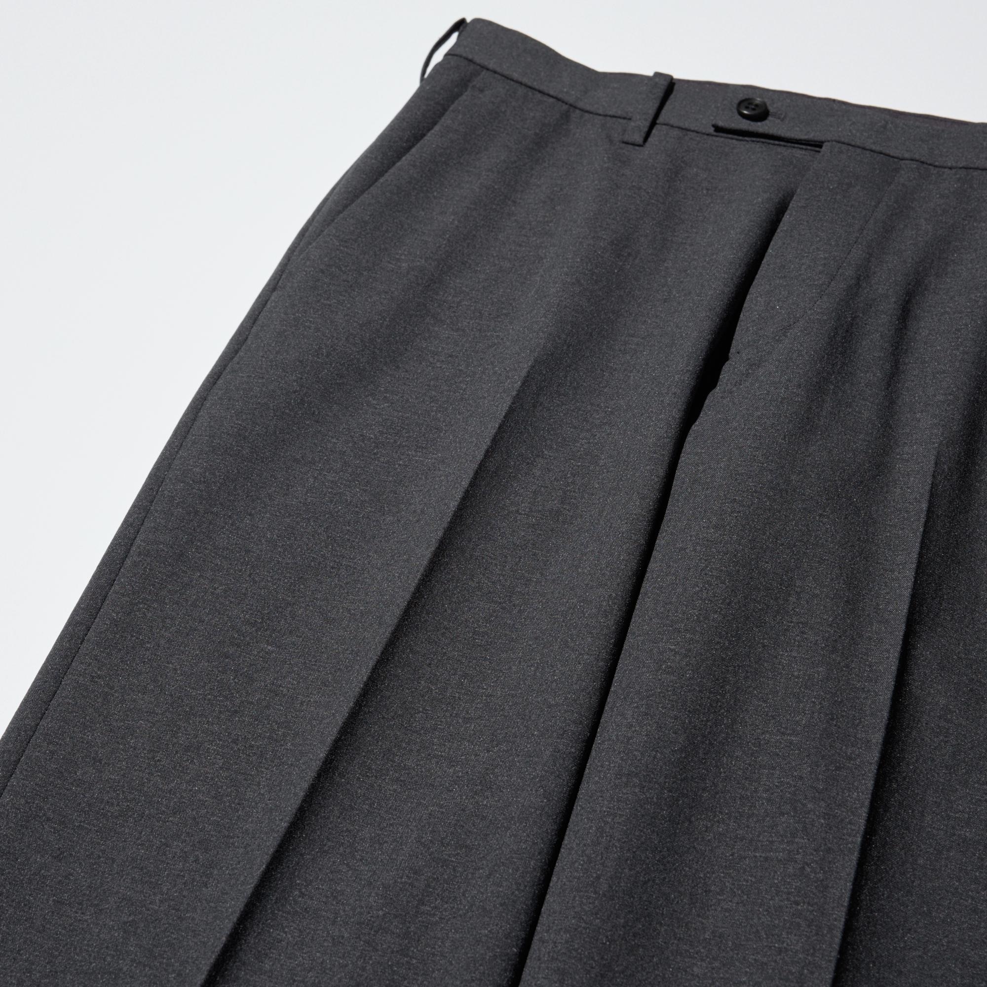 Updated in a refined design featuring a fly front and more tucks at the cuffs.a