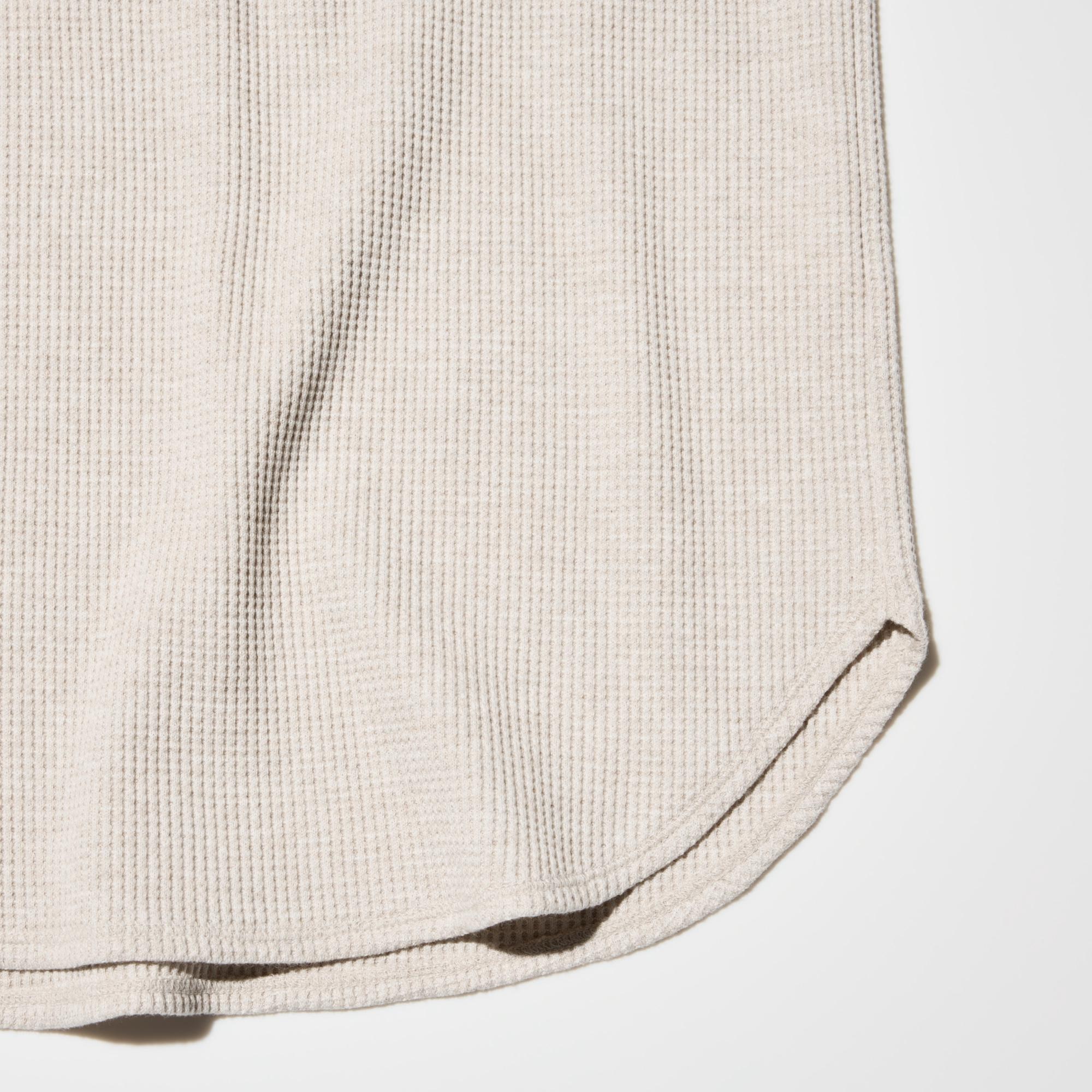 The round hem looks great tucked in or untucked.