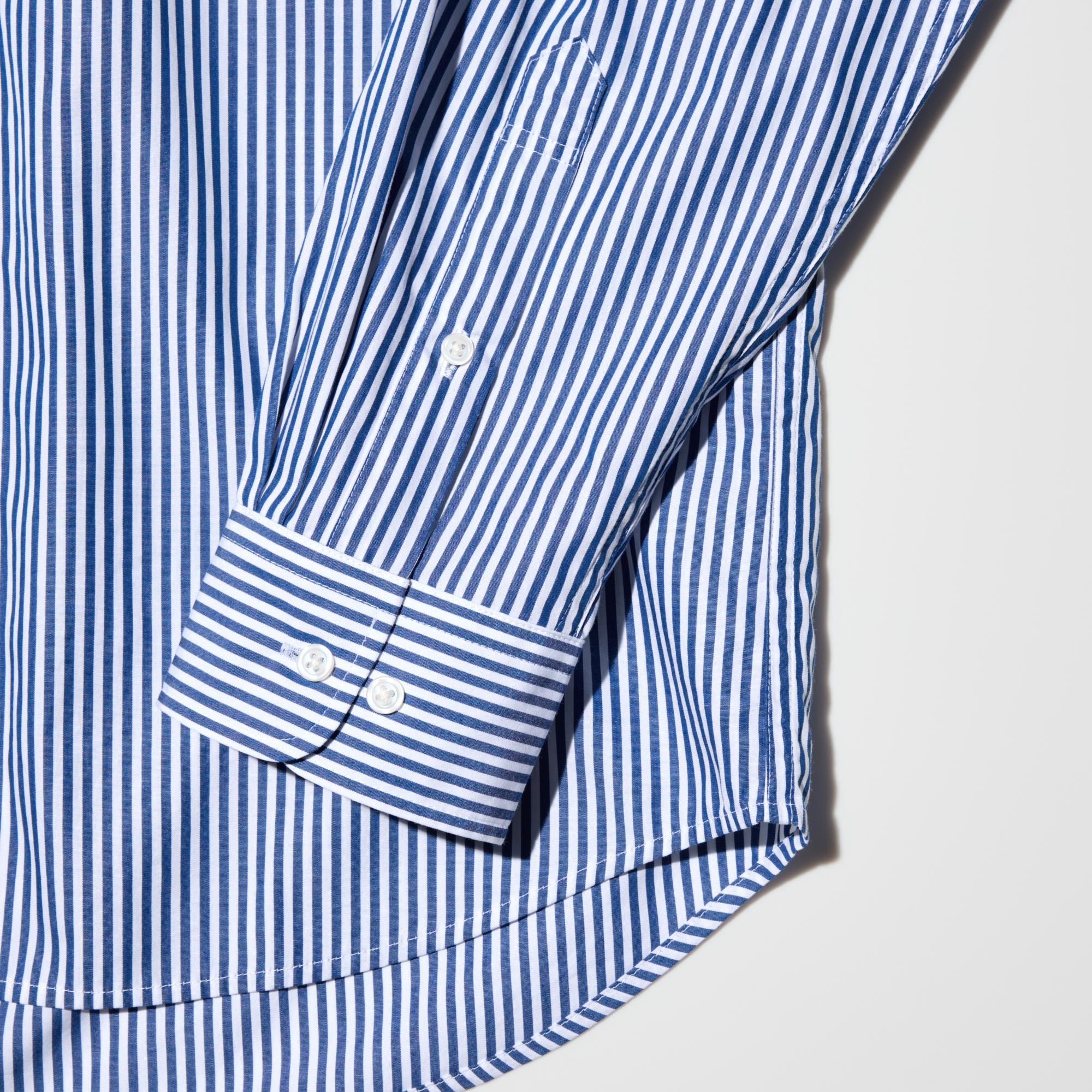 Patterns are carefully aligned by hand to ensure a symmetrical pattern at the collar, placket, sleeves, and cuffs.