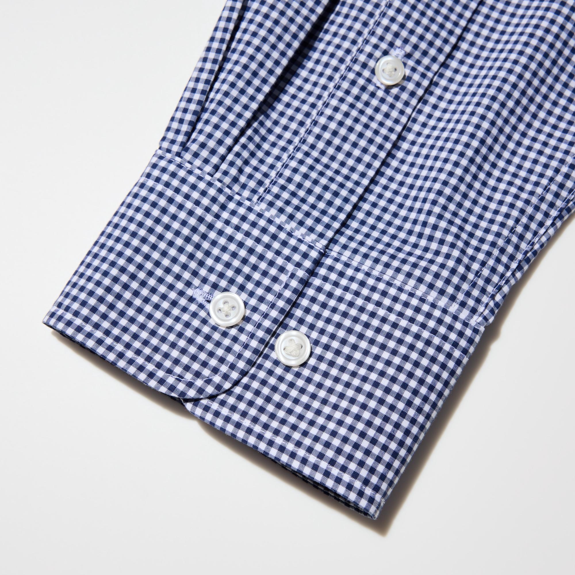 Patterns are carefully aligned by hand to ensure a symmetrical pattern at the collar, placket, sleeves, and cuffs.