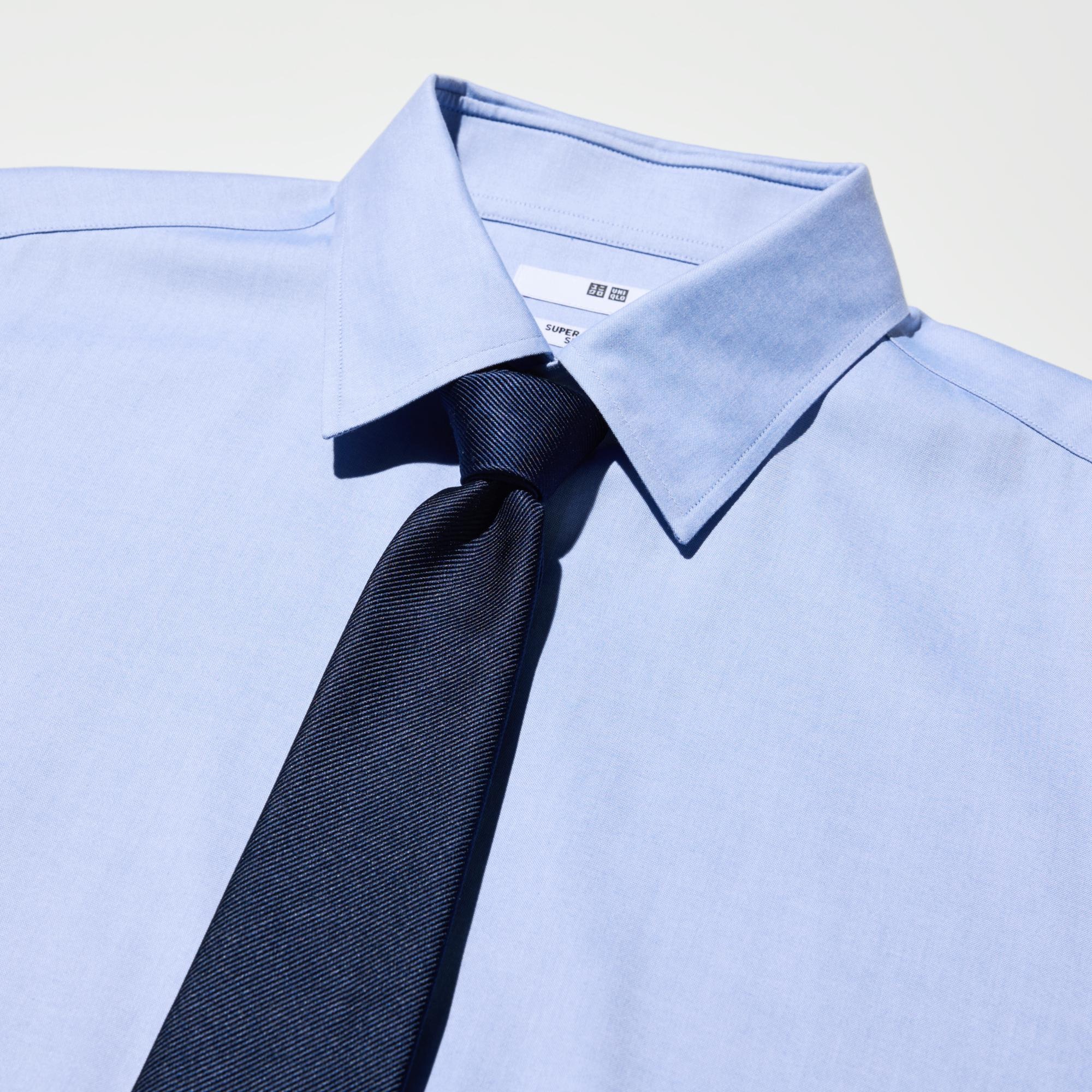 The collar band height and collar shape are designed to look good with a necktie.