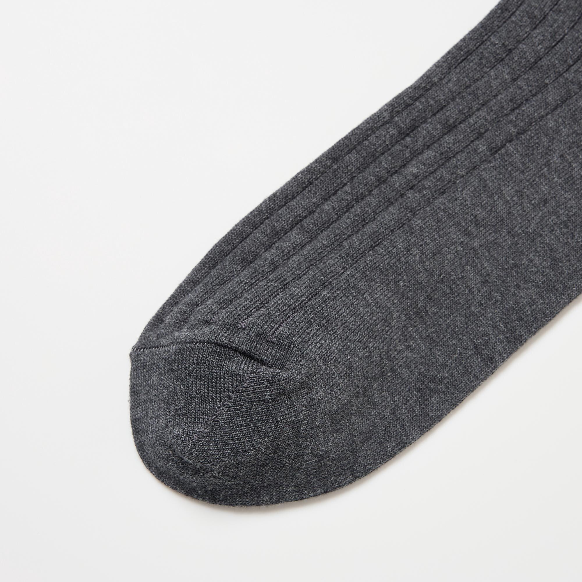 The toe and heel are reinforced to prevent holes and ensure long-lasting wear.